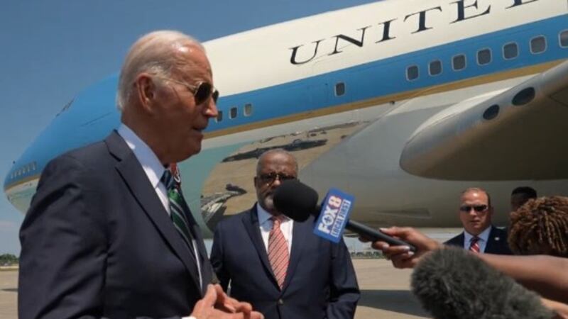 President Joe Biden answers questions Tuesday (Aug. 13) on the tarmac outside Air Force One...