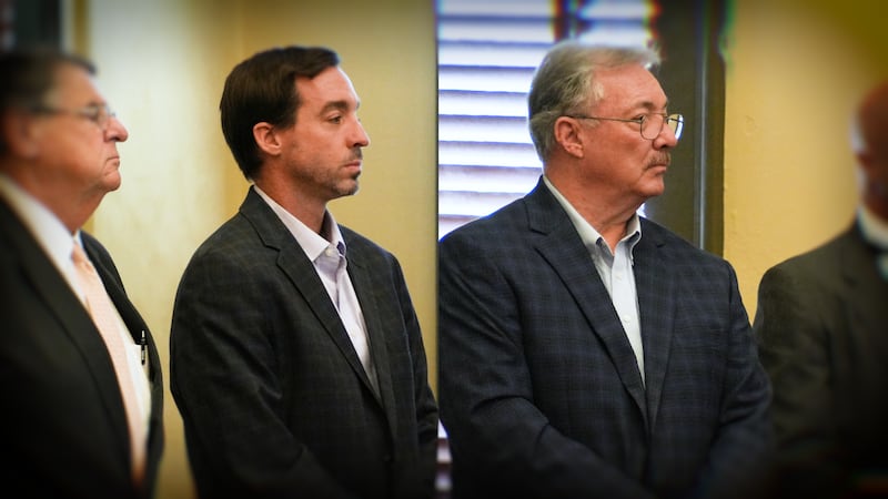 Philip and Alan Moran standing with their attorneys, Donald Rafferty and Tracy Klein.
