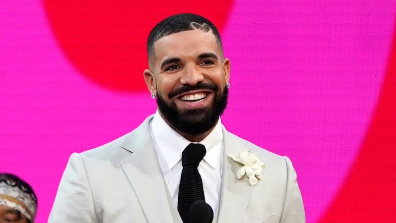 A viral video showed Drake holding a note from the concertgoer on stage. The note said the...